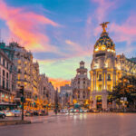 Madrid city skyline gran via street twilight , Spain